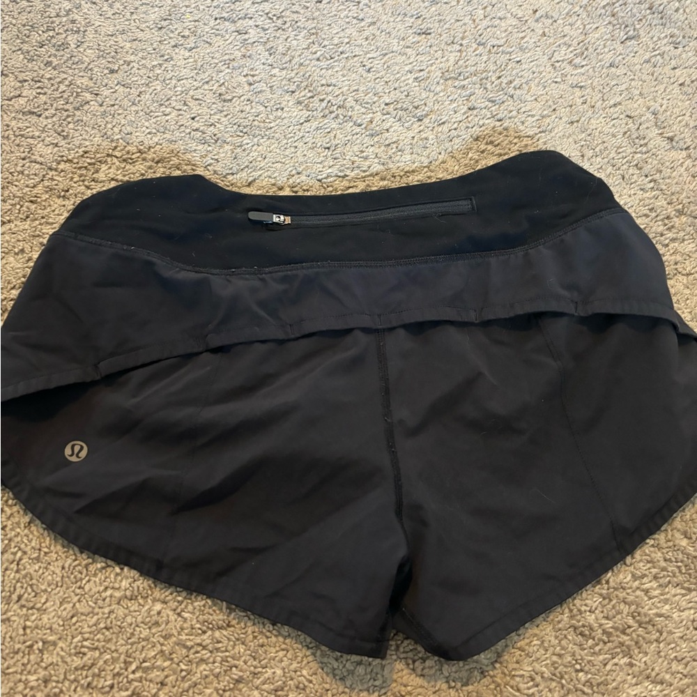 Black Lululemon Speed up shorts in size 4